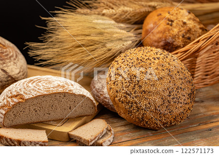 Variety of freshly baked loaves of bread 122571173