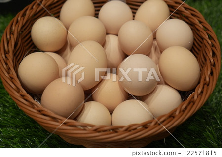 Healthy eggs in a basket Healthy eggs in a basket 122571815