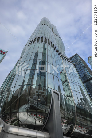 Dec 16 2024 Modern Architectural Skyscraper with Reflective Glass Facade 122571857