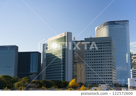Evening view of the office district of Shiodome, Tokyo 122572600