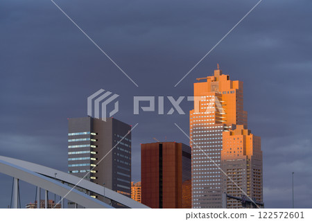 Skyscrapers in the setting sun 122572601