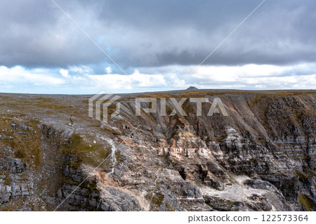 Aerial view of the Muckish mountain and the trail called miners path in county Donegal. Ireland Aerial view of the Muckish mountain and the trail called miners path in county Donegal. Ireland 122573364