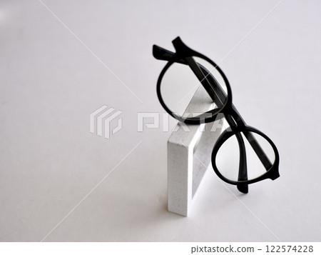 Glasses and miscellaneous goods photographed on a white background Glasses and miscellaneous goods photographed on a white background 122574228