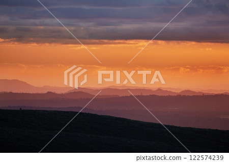 Sunset Hilly Landscape, Twilight Glow 122574239