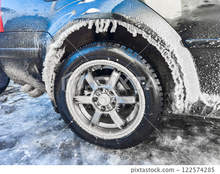 Icicles Are Forming under a Car wheel arch Harsh Winter Conditions and Cold Environments 122574285