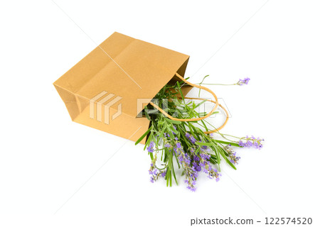 Bouquet of lavender flowers in paper bag isolated on white. Bouquet of lavender flowers in paper bag isolated on white. 122574520