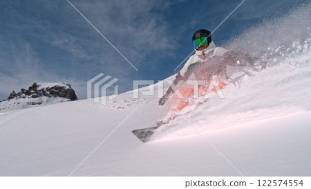 Freeze Motion of Snowboarder Running Down. Powder Snow Exploding. 122574554