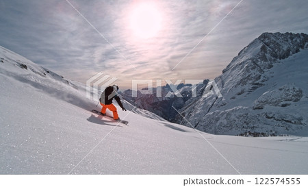 Freeze Motion of Snowboarder Running Down. Powder Snow Exploding. 122574555
