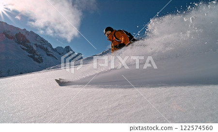 Freeze Motion of Skier Running Down. Powder Snow Exploding. 122574560