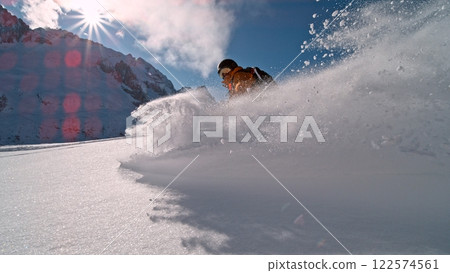 Freeze Motion of Skier Running Down. Powder Snow Exploding. 122574561