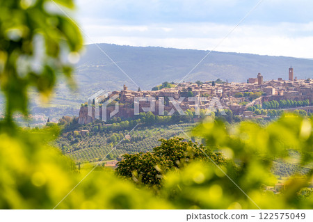 Orvieto, Umbria, Italy: Panoramic view of town nestled in hills. 122575049