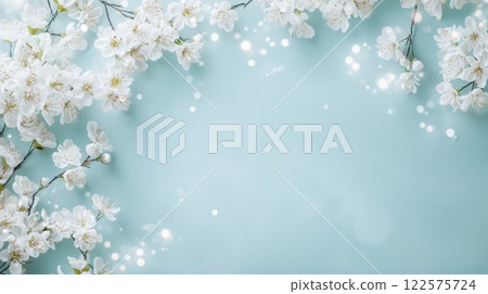 Delicate Blossoming Flowers Against a Soft Blue Background 122575724