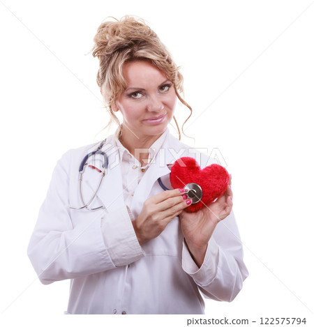 Doctor with stethoscope examining red heart. Doctor with stethoscope examining red heart. 122575794