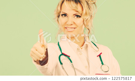 Female doctor showing thumb up. 122575817