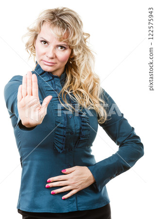 Adult blondie woman making hand gesture 122575943