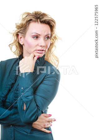 Worried unhappy blonde woman Worried unhappy blonde woman 122575965