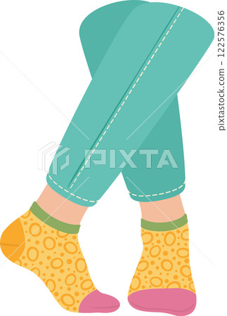 Crossed woman legs with turquoise trousers and yellow patterned socks on white background representing fashion, clothing, style, and modern trends 122576356