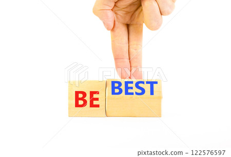 Motivational and inspirational be best symbol. Concept words Be best on beautiful wooden block. Beautiful white background Businessman hand. Business motivational be best concept. Copy space. Motivational and inspirational be best symbol. Concept words Be best on beautiful wooden block. Beautiful white background Businessman hand. Business motivational be best concept. Copy space. 122576597