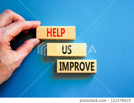 Help us improve symbol. Concept words Help us improve on beautiful wooden blocks. Beautiful blue background. Businessman hand. Business motivational help us improve concept. Copy space. Help us improve symbol. Concept words Help us improve on beautiful wooden blocks. Beautiful blue background. Businessman hand. Business motivational help us improve concept. Copy space. 122576625