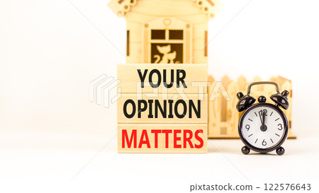 Your opinion matters symbol. Concept words Your opinion matters on beautiful wooden blocks. Beautiful white background. Black alarm clock. Business your opinion matters concept. Copy space. 122576643