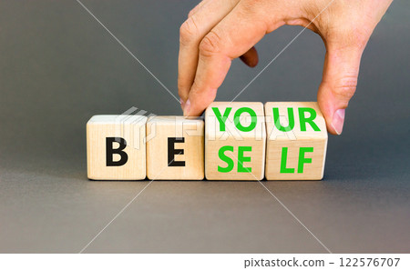 Motivational be yourself symbol. Concept words Be yourself on beautiful wooden block. Beautiful grey background Businessman hand. Business motivational be yourself concept. Copy space. 122576707