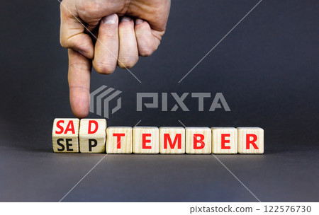 September is Sadtember symbol. Concept words September is Sadtember on beautiful wooden blocks. Beautiful grey background. Businessman hand. Business September is Sadtember concept. Copy space. 122576730