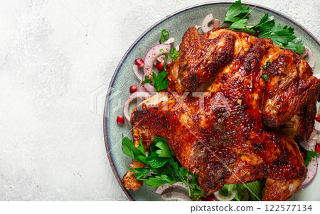 whole fried chicken, with spices, grilled chicken, on a light background, top view, homemade, no people, 122577134