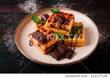 Viennese waffles, with chocolate, breakfast, on a dark background, no people, selective focus, 122577136