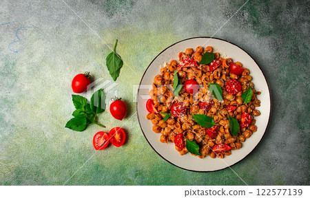 Tuscan pasta with smoked paprika and basil,parmesan cheese, Italian traditional cuisine, Tuscan pasta with smoked paprika and basil,parmesan cheese, Italian traditional cuisine, 122577139