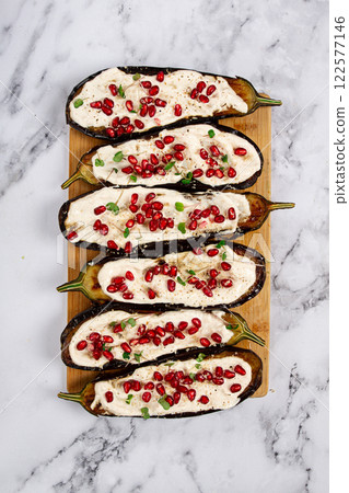 fried eggplant with sauce, decorated with microgreens and pomegranate seeds, eggplant appetizer, top view, homemade, no people, fried eggplant with sauce, decorated with microgreens and pomegranate seeds, eggplant appetizer, top view, homemade, no people, 122577146