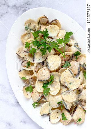 vongole clams, in cream sauce, on a white plate, homemade, top view, no people, vongole clams, in cream sauce, on a white plate, homemade, top view, no people, 122577167