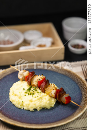 Typical czech cuisine chicken skewer with red pepper, onion, sausage and mashed potatoes Typical czech cuisine chicken skewer with red pepper, onion, sausage and mashed potatoes 122577980