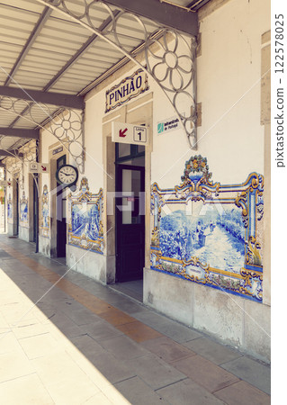 Blue azulejos with motifs from Douro Valley, train station of Pinhao, Portugal 122578025