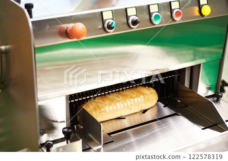 Sliced bread in cutting machine Sliced bread in cutting machine 122578319