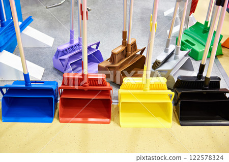 Brushes and dustpan for cleaning in store 122578324