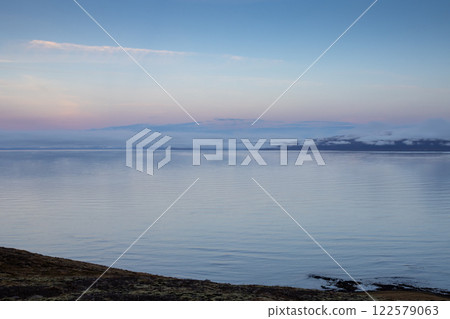 Evening fjord, mountains and sky, Iceland 122579063
