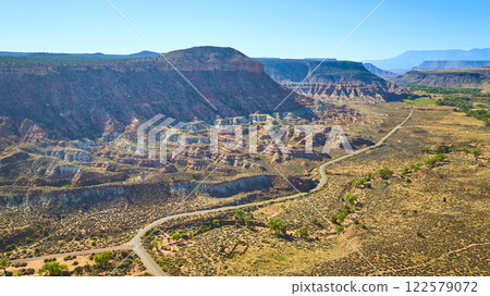 Aerial of Utah Mesa and Winding Desert Road 122579072