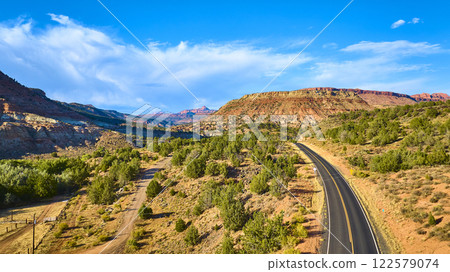 Aerial of Kolob Canyon Desert Road in Golden Light 122579074