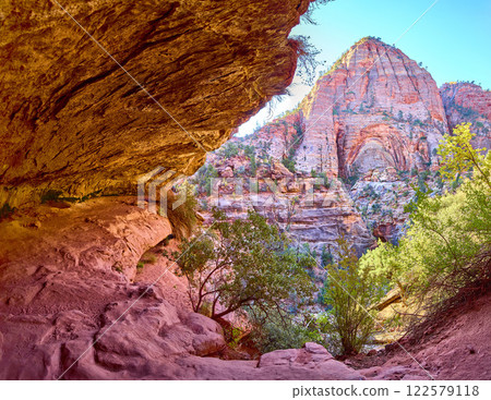 Zion National Park Rocky Overhang and Mountain at Sunrise Ground View Zion National Park Rocky Overhang and Mountain at Sunrise Ground View 122579118