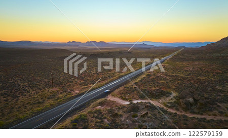 Aerial Fly Over Desert Road at Sunset in Utah 122579159
