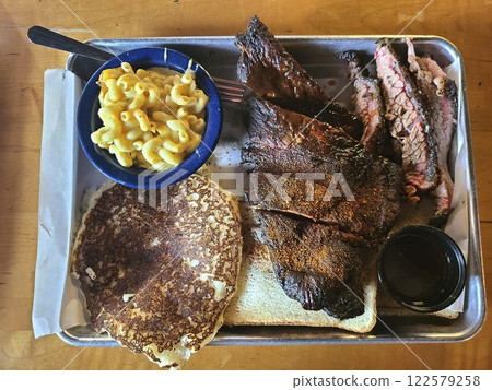 Southern BBQ Brisket Mac and Cheese with Pancake Overhead View Southern BBQ Brisket Mac and Cheese with Pancake Overhead View 122579258