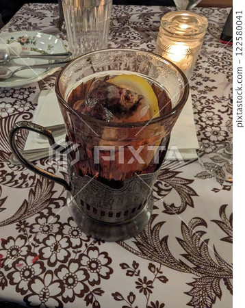 Traditional tea in a glass with a metal cup holder in a Russian restaurant in Portland, USA 122580041