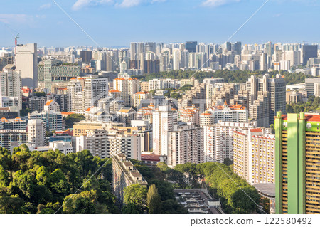 Modern developing residential district with tall skyscrapers and green park in the foreground, Singapore Modern developing residential district with tall skyscrapers and green park in the foreground, Singapore 122580492