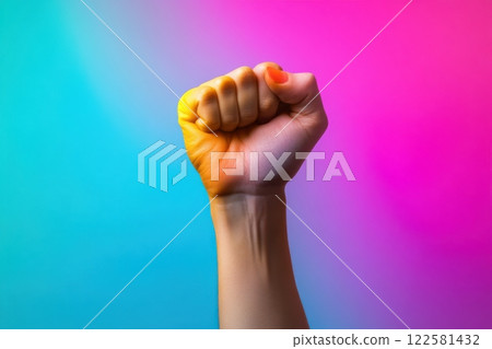Empowering gesture modern background image of a raised fist vibrant environment close-up perspective strength and unity concept 122581432