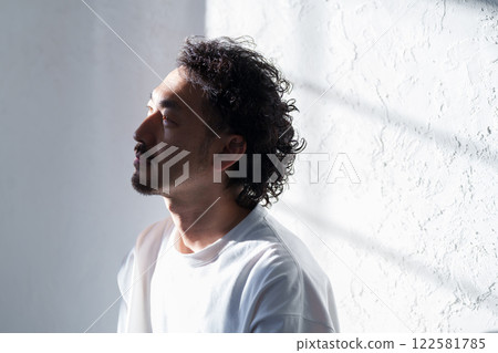 Middle aged man suffering Middle aged man suffering 122581785
