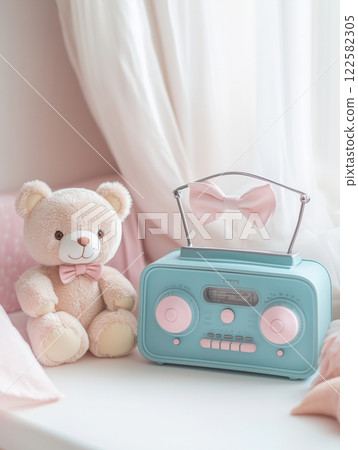 Bear and pastel colored radio 122582305