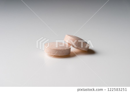 Supplement tablets 122583251