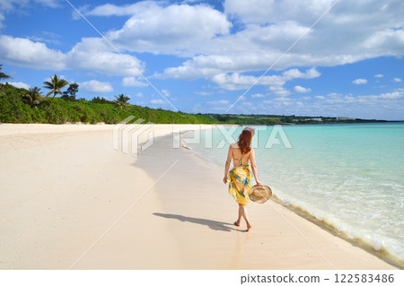 A woman enjoying the seaside 122583486