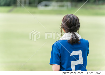 Soccer fans and supporters cheering at a soccer game Soccer fans and supporters cheering at a soccer game 122583623