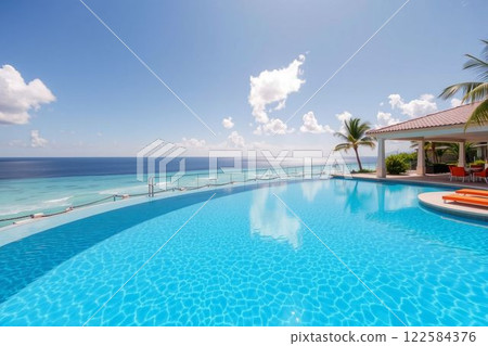 Luxurious infinity pool overlooking the ocean 122584376